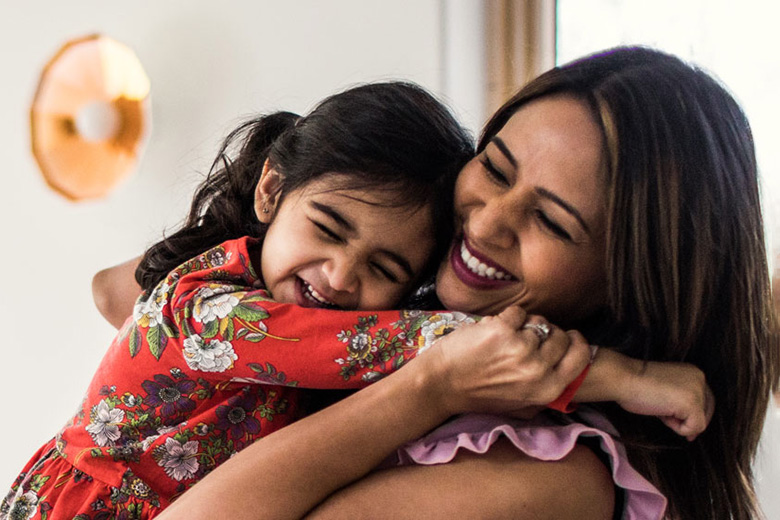 Mother and Daughter Hugging